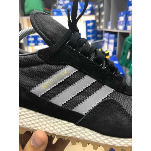 Gold and best sale black addidas